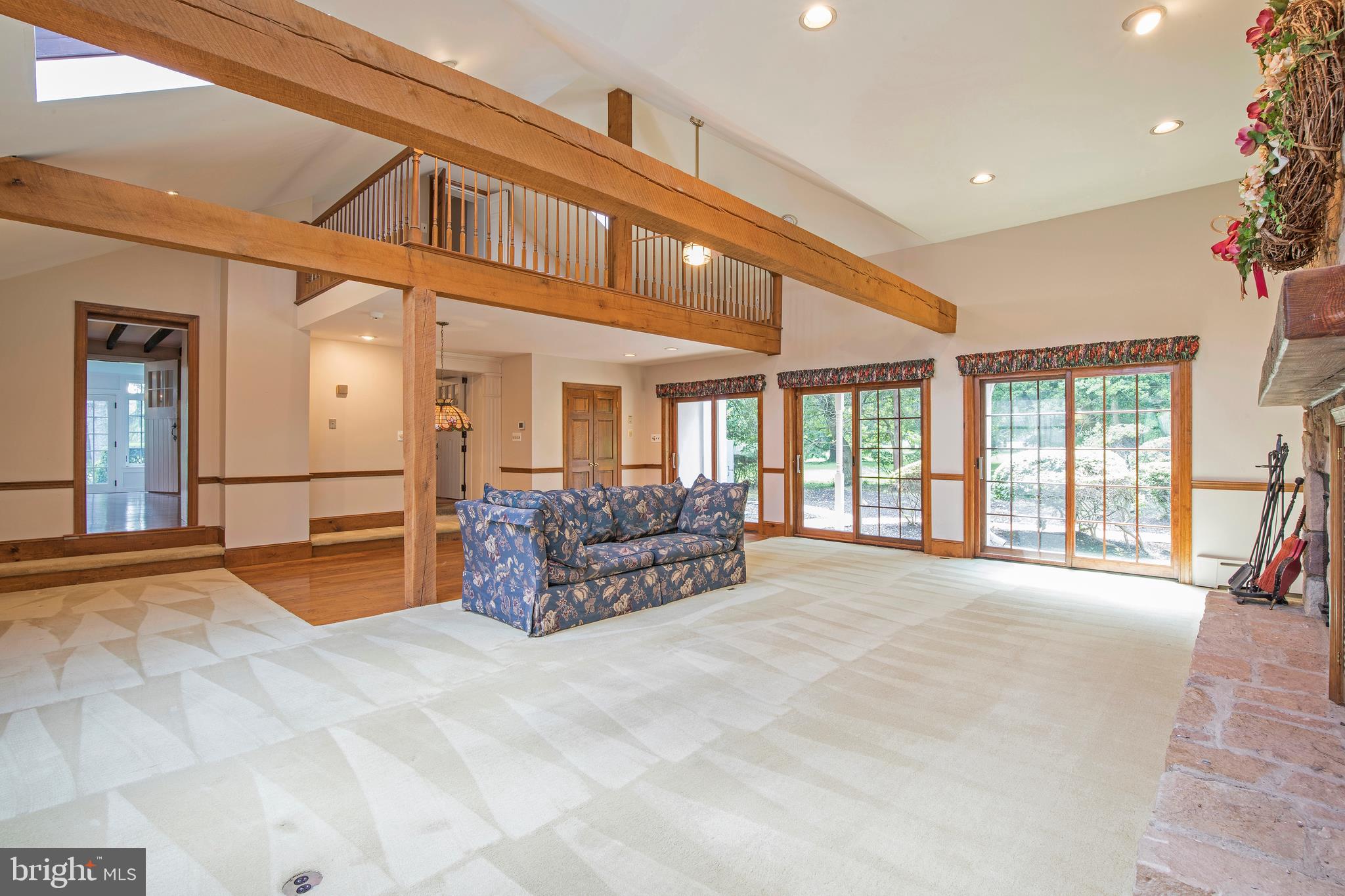 1181 Oxford Valley Road Yardley, PA 19067 - Photo 25 of 61 Vaulted Ceiling & Stone Fireplace in Family Room