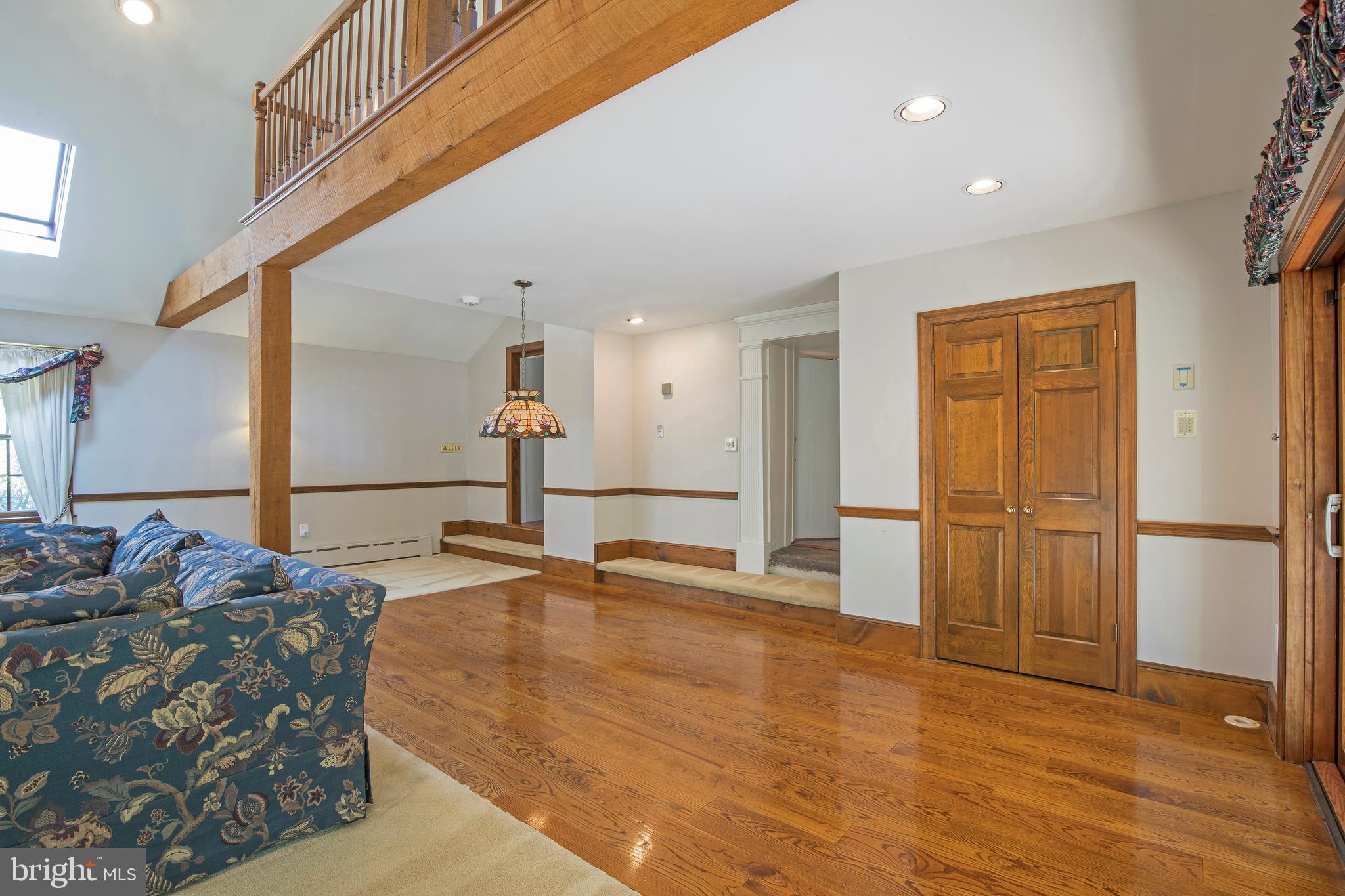 1181 Oxford Valley Road Yardley, PA 19067 - Photo 27 of 61 Vaulted Ceiling & Stone Fireplace in Family Room