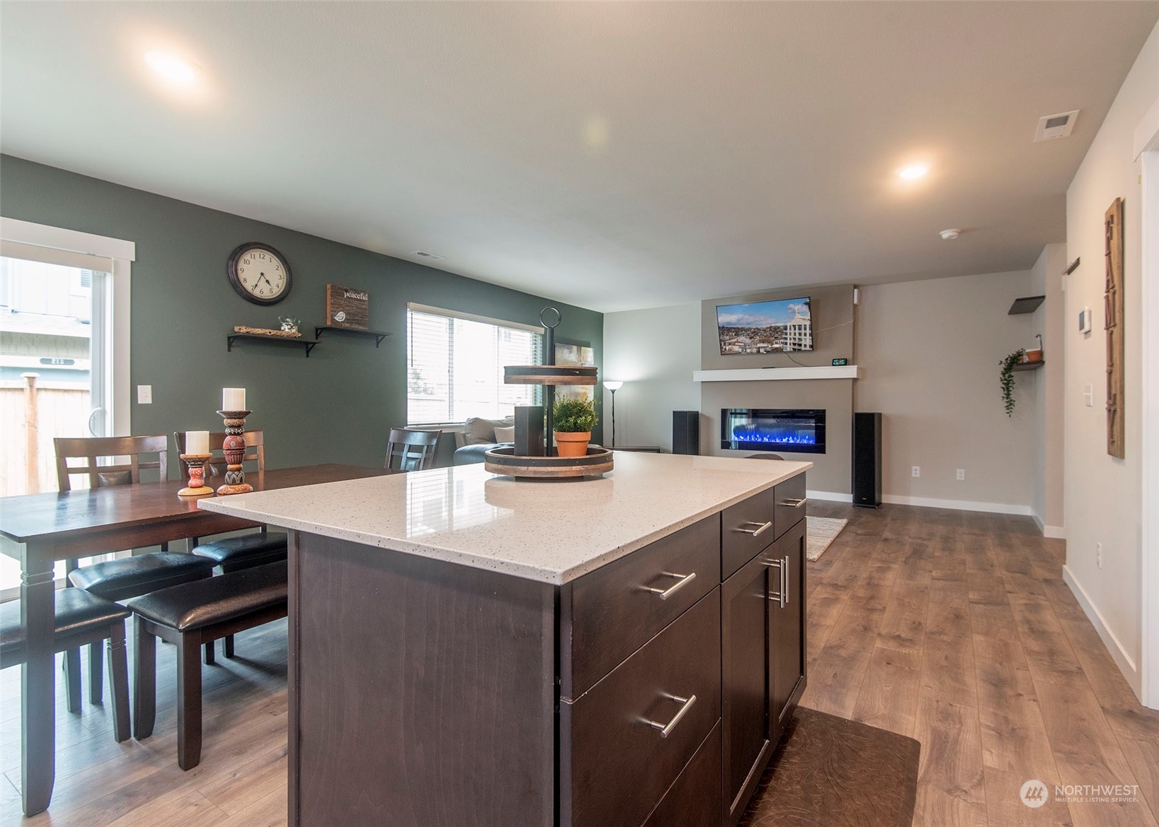 215 169th Place Southwest Bothell, WA 98012 - Photo 15 of 30 a kitchen with kitchen island a sink stove and a refrigerator