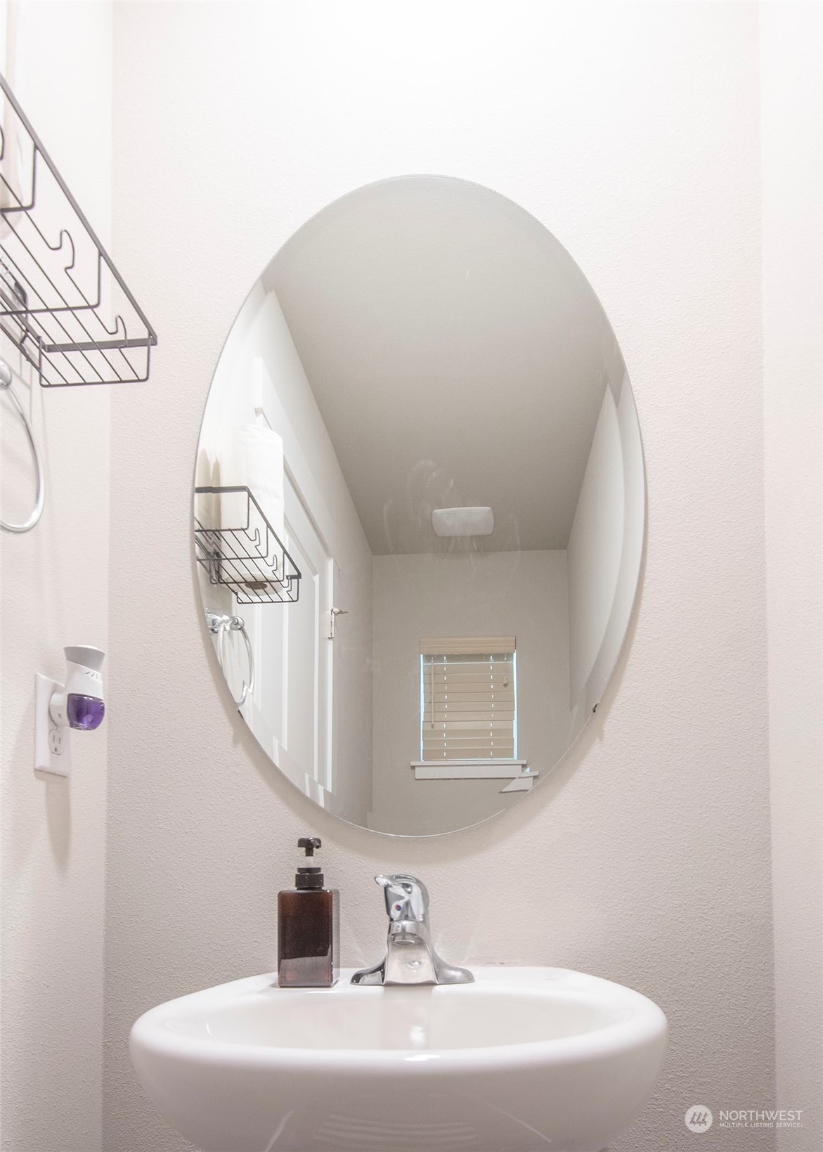 215 169th Place Southwest Bothell, WA 98012 - Photo 16 of 30 a bathroom with a sink and a mirror