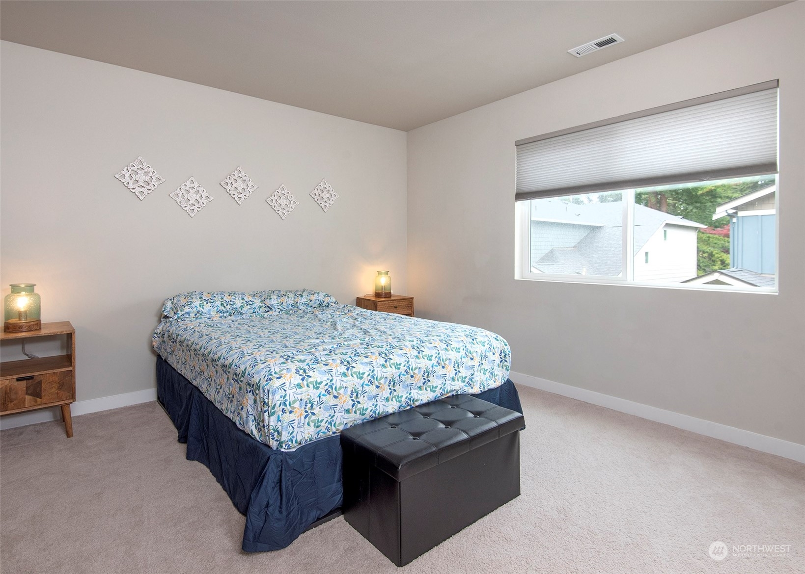 215 169th Place Southwest Bothell, WA 98012 - Photo 17 of 30 a bedroom with a bed and window