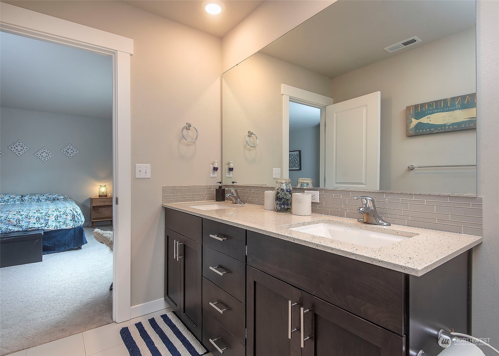 215 169th Place Southwest Bothell, WA 98012 - Photo 20 of 30 a bathroom with a double vanity sink and a mirror