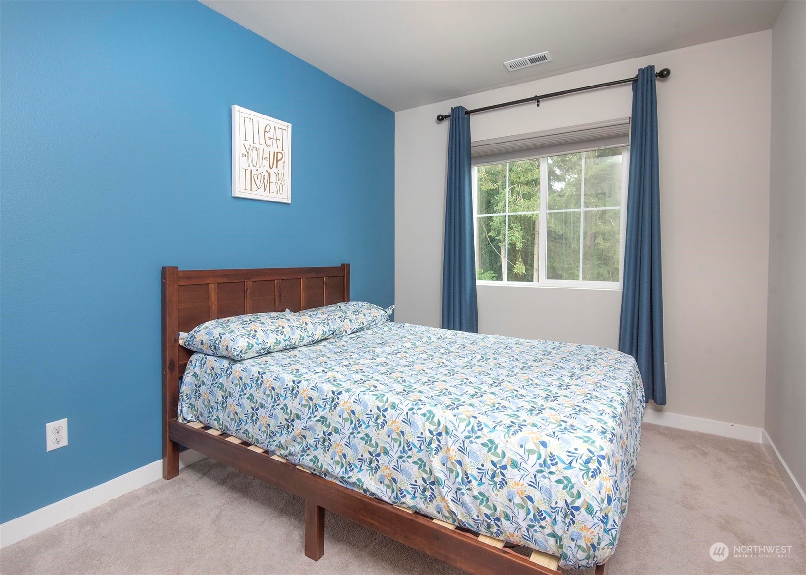 215 169th Place Southwest Bothell, WA 98012 - Photo 21 of 30 a bedroom with a bed and window