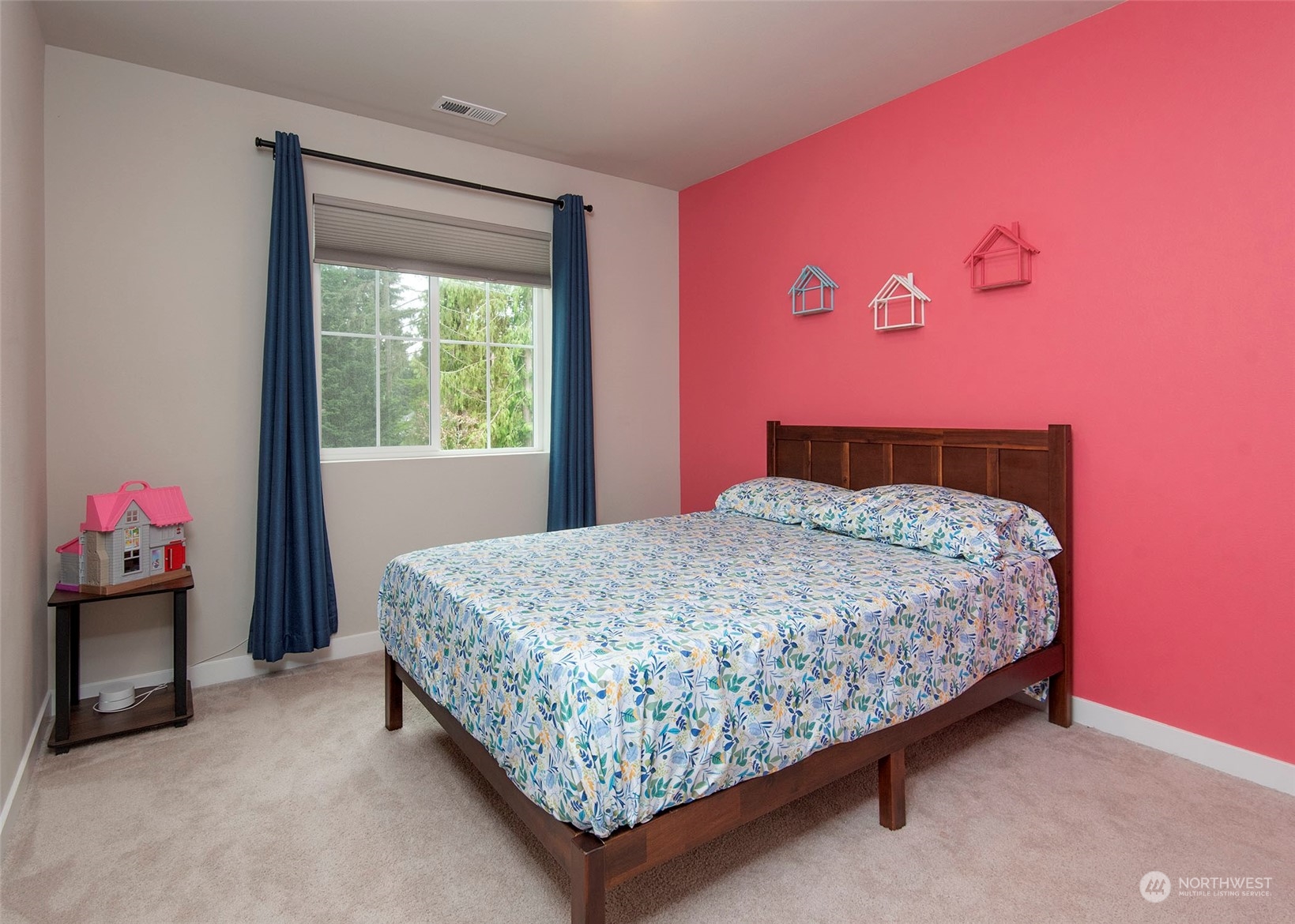 215 169th Place Southwest Bothell, WA 98012 - Photo 22 of 30 a bedroom with a bed and a dresser