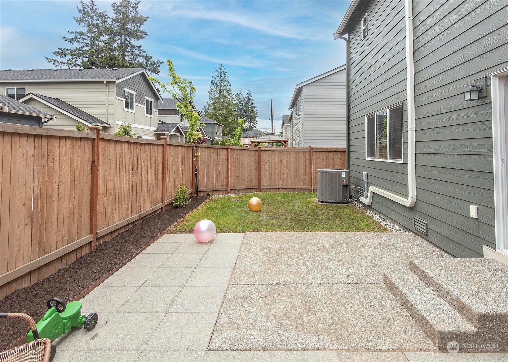 215 169th Place Southwest Bothell, WA 98012 - Photo 27 of 30 a view of a backyard with a patio