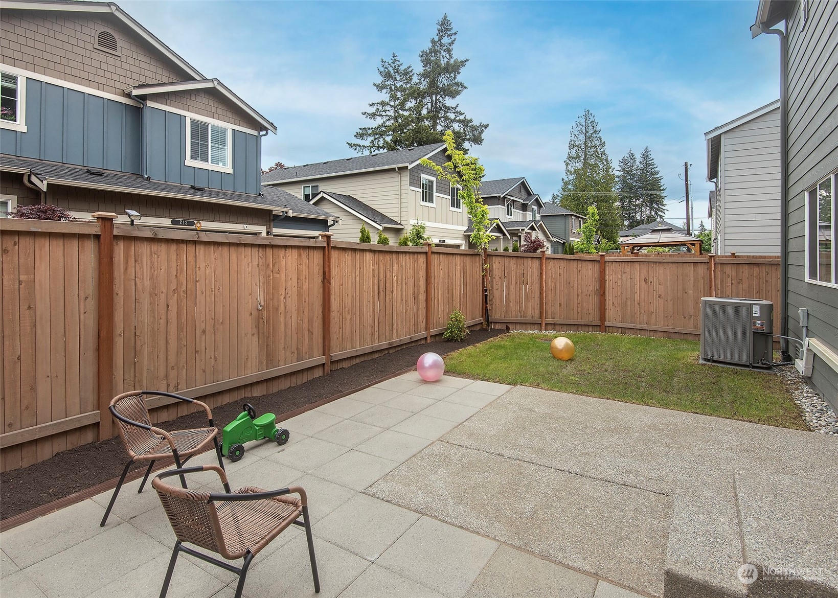 215 169th Place Southwest Bothell, WA 98012 - Photo 29 of 30 a backyard of a house with table and chairs
