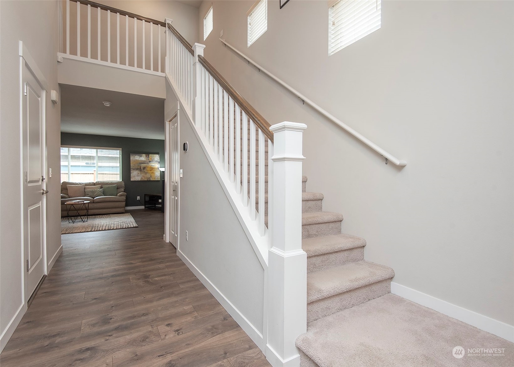 215 169th Place Southwest Bothell, WA 98012 - Photo 3 of 30 a view of entryway and hall with wooden floor