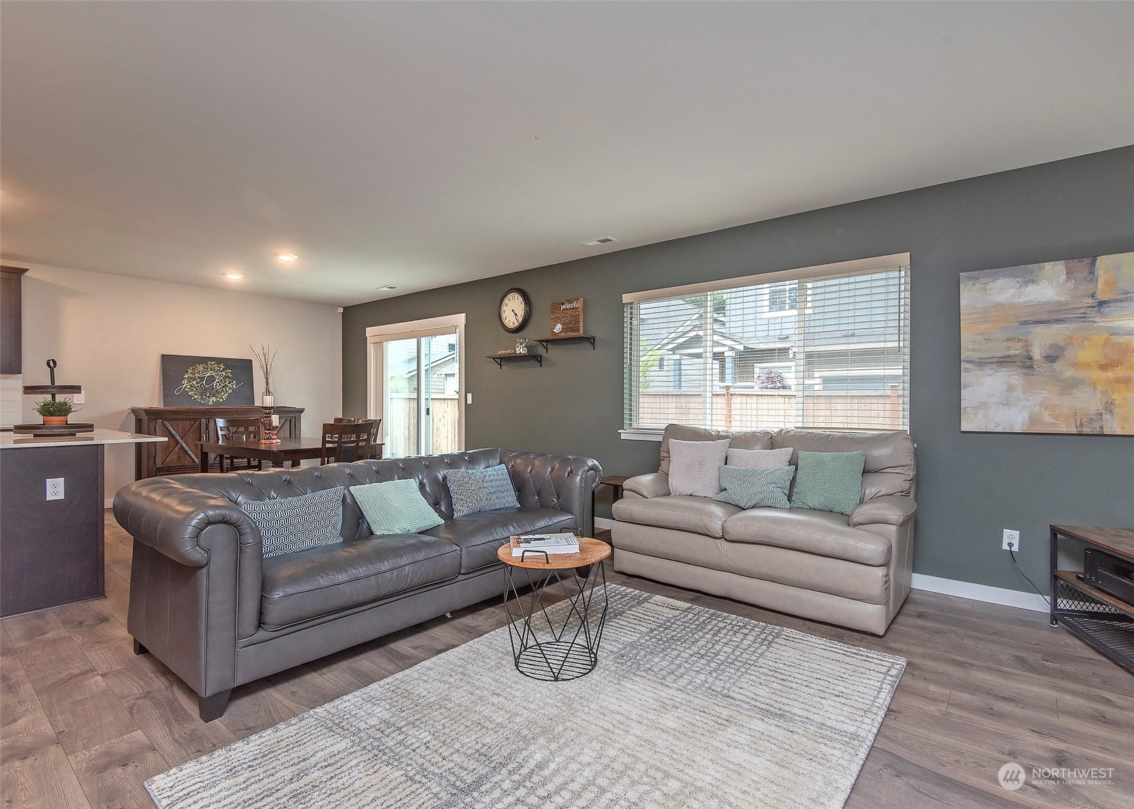 215 169th Place Southwest Bothell, WA 98012 - Photo 6 of 30 a living room with furniture and a large window