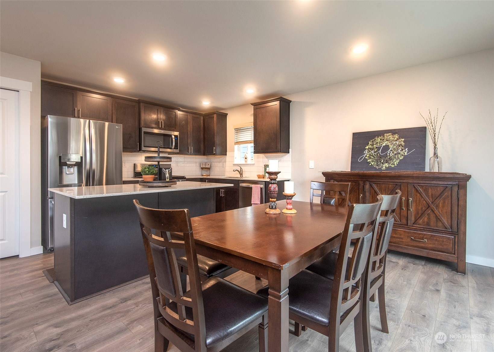 215 169th Place Southwest Bothell, WA 98012 - Photo 10 of 30 a dining room with furniture and window
