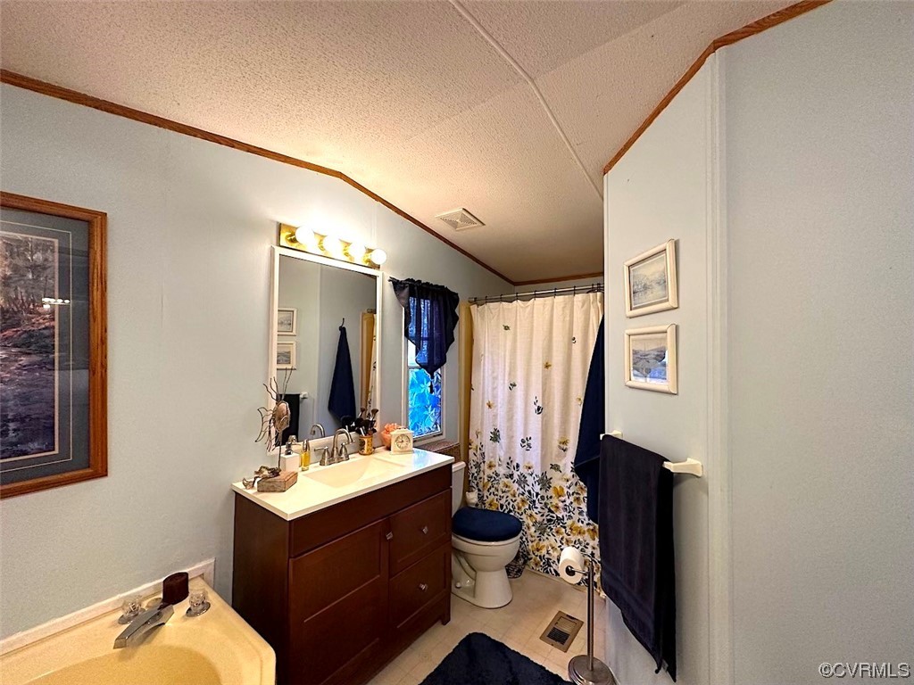 13504 Scotts Road Dewitt, VA 23840 - Photo 14 of 50 a bathroom with a sink mirror and a shower