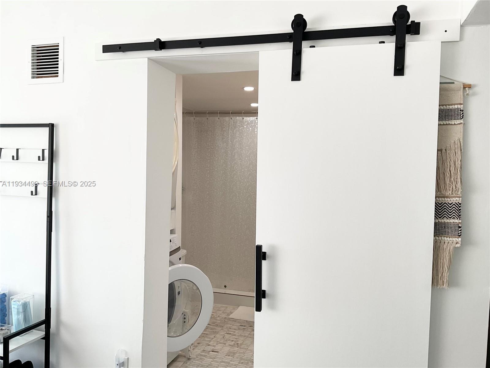 161 Northwest 145th Street Miami, FL 33168 - Photo 10 of 39 a close view of a shower in the bathroom