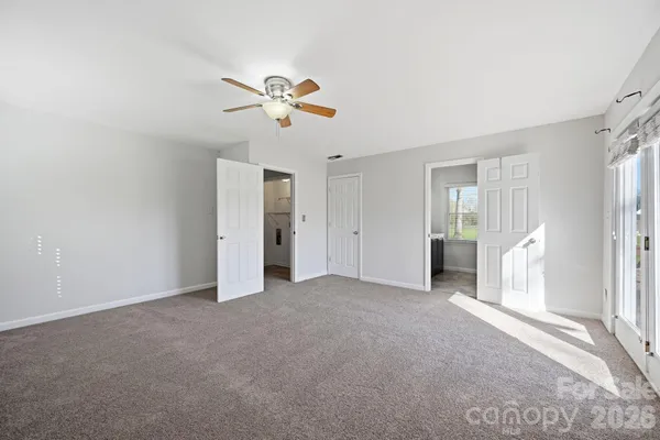 a bathroom with a sink vanity and a mirror