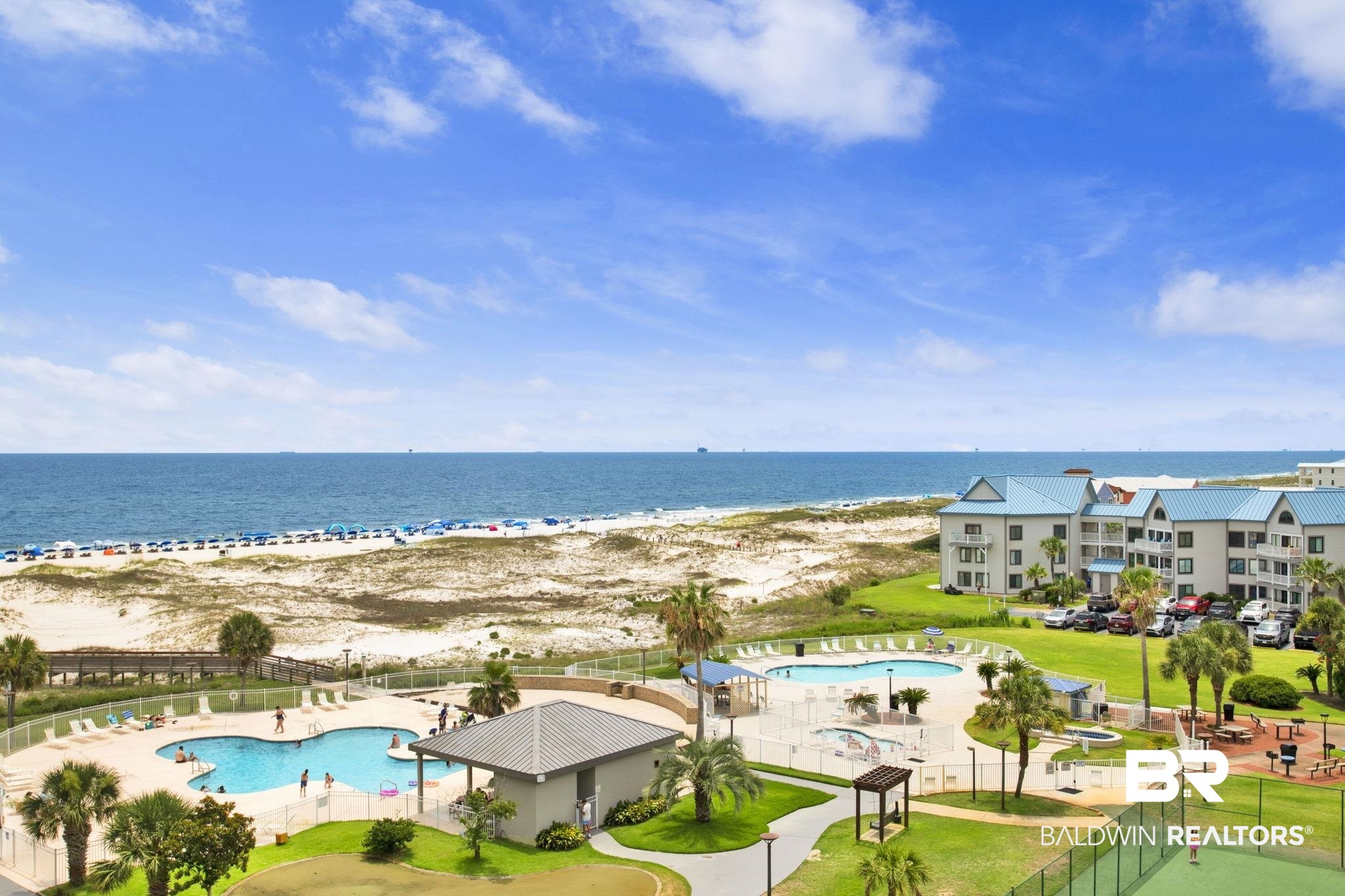 375 Plantation Road, Unit 5514 Gulf Shores, AL 36542 - Photo 2 of 44 Drone / aerial view of a pool and a large body of water