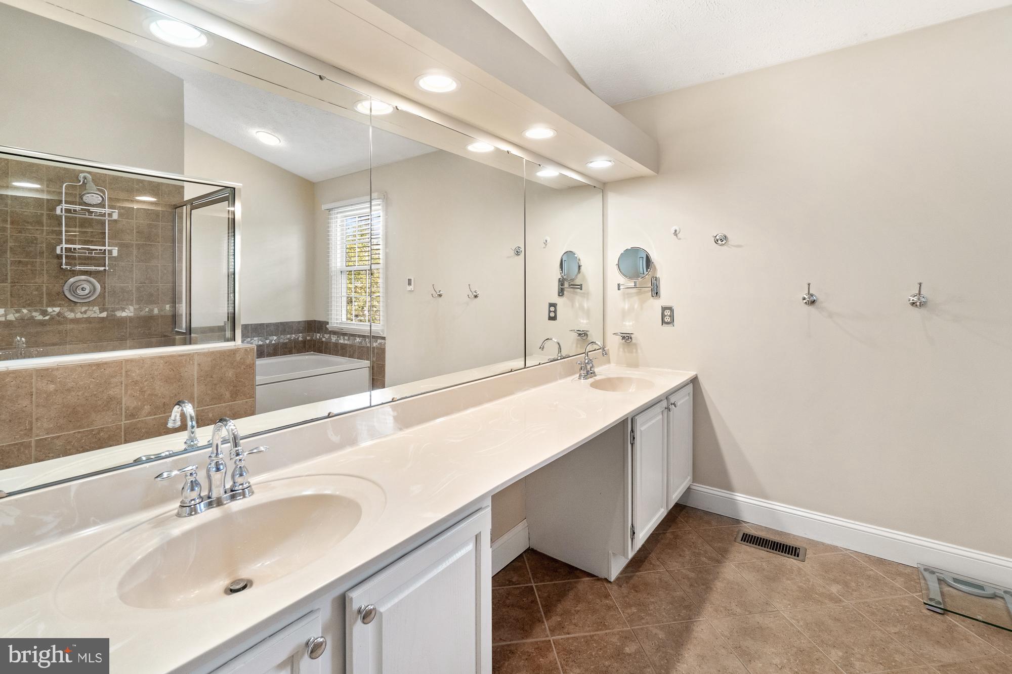 17226 Spates Hill Road Poolesville, MD 20837 - Photo 36 of 70 Huge primary bathroom with double sink...