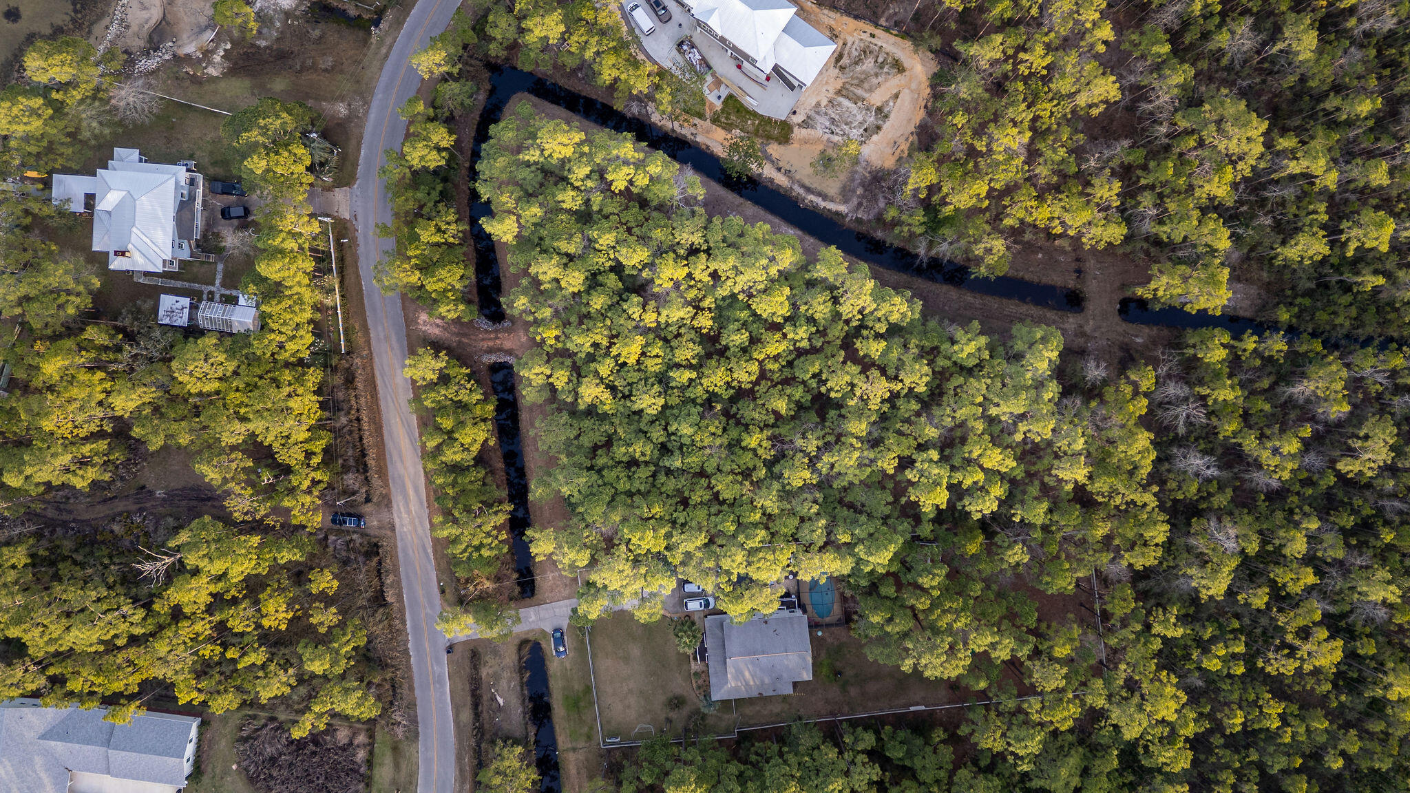 Lot 4 Whisper Lane Santa Rosa Beach, FL 32459 - Photo 7 of 22 a view of a house with a tree