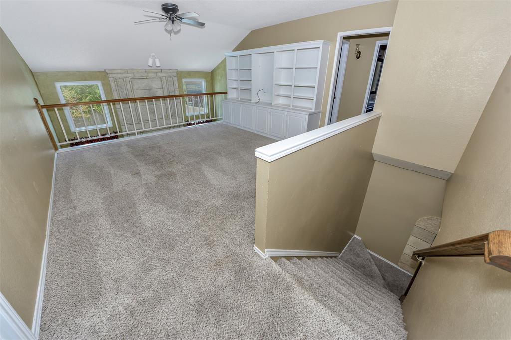 716 Bridget Way Hurst, TX 76054 - Photo 11 of 19 a view of a hallway with staircase