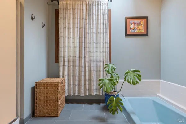 a bath room with a rug