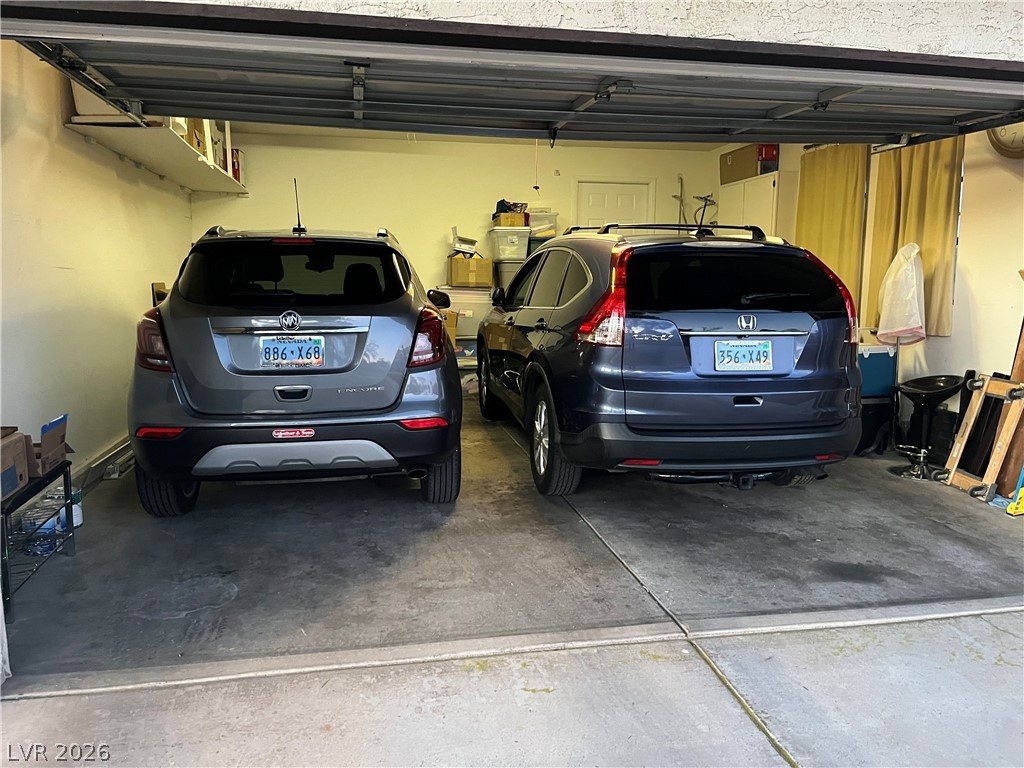 6412 West Pearcrest Road Las Vegas, NV 89108 - Photo 16 of 17 Ample parking within this secure, two-car attached garage.