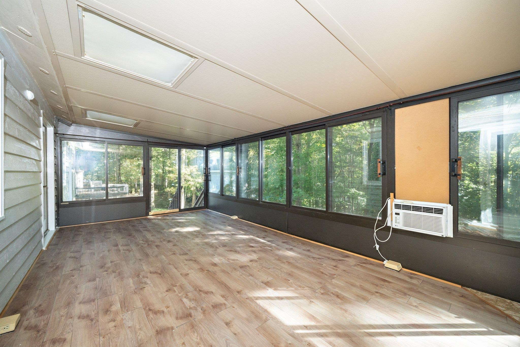 6304 Rushingbrook Drive Raleigh, NC 27612 - Photo 16 of 51 a view of an empty room with a window