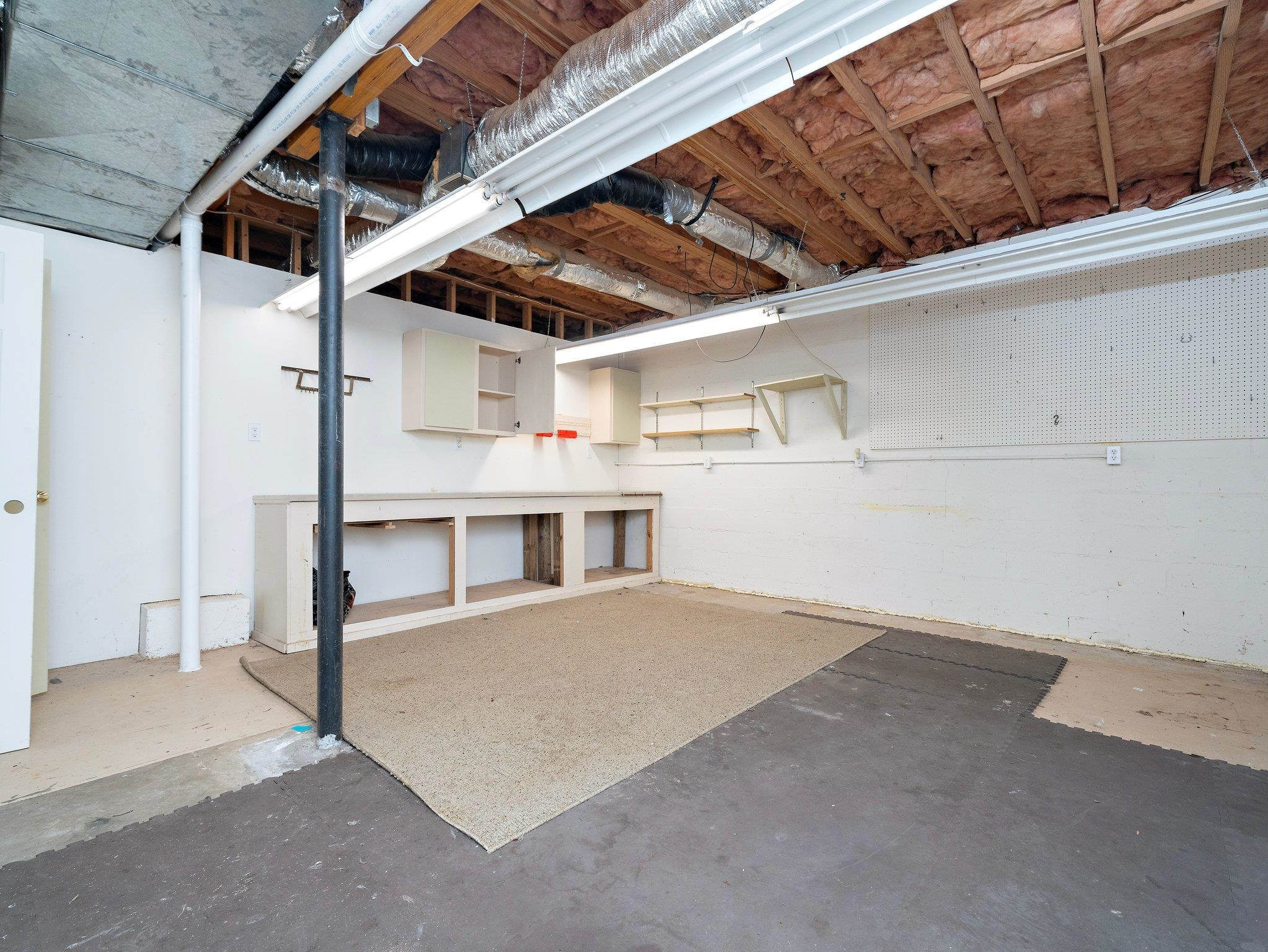 6304 Rushingbrook Drive Raleigh, NC 27612 - Photo 49 of 51 a view of a garage