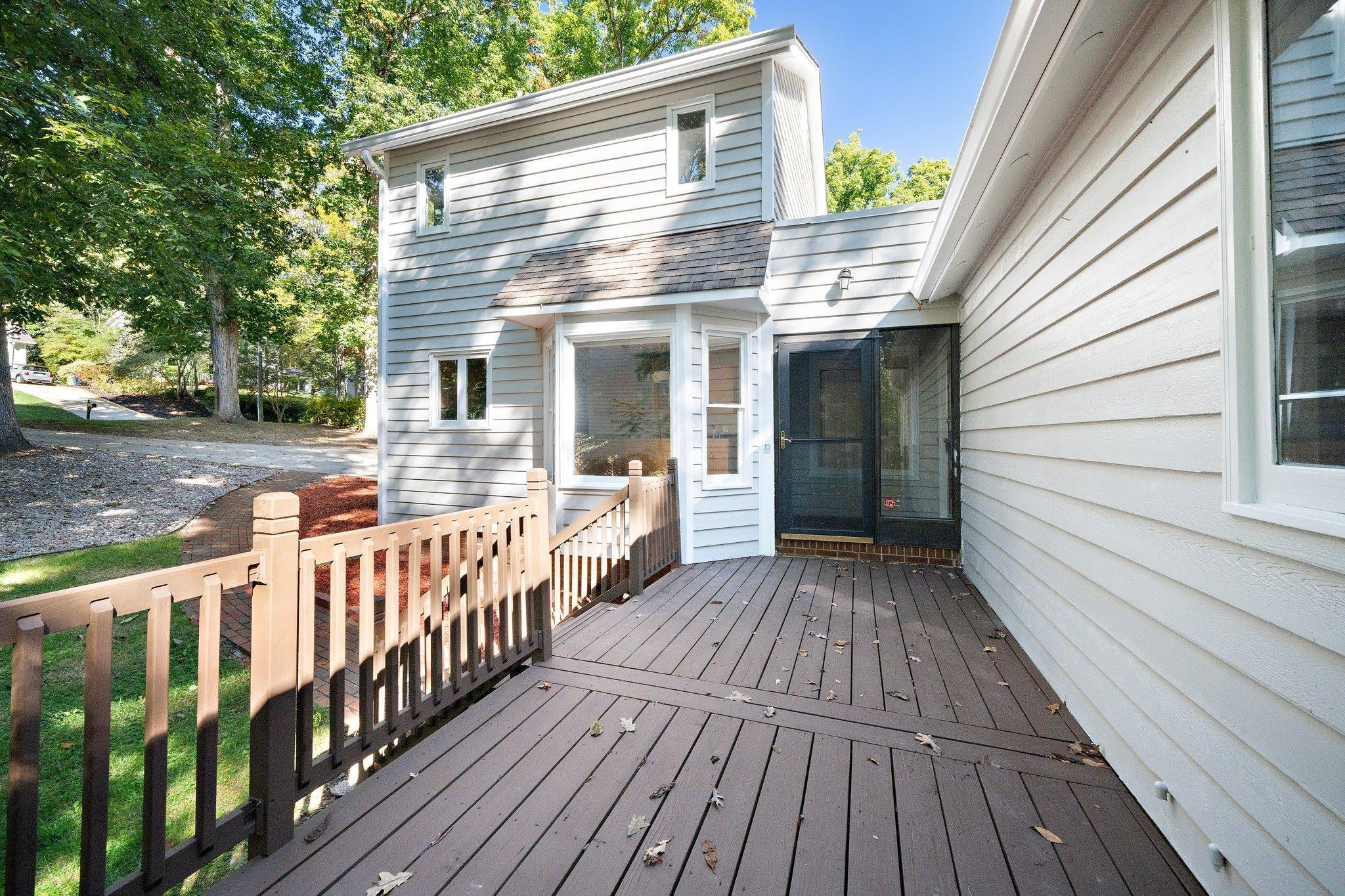 6304 Rushingbrook Drive Raleigh, NC 27612 - Photo 8 of 51 a view of a house with wooden deck