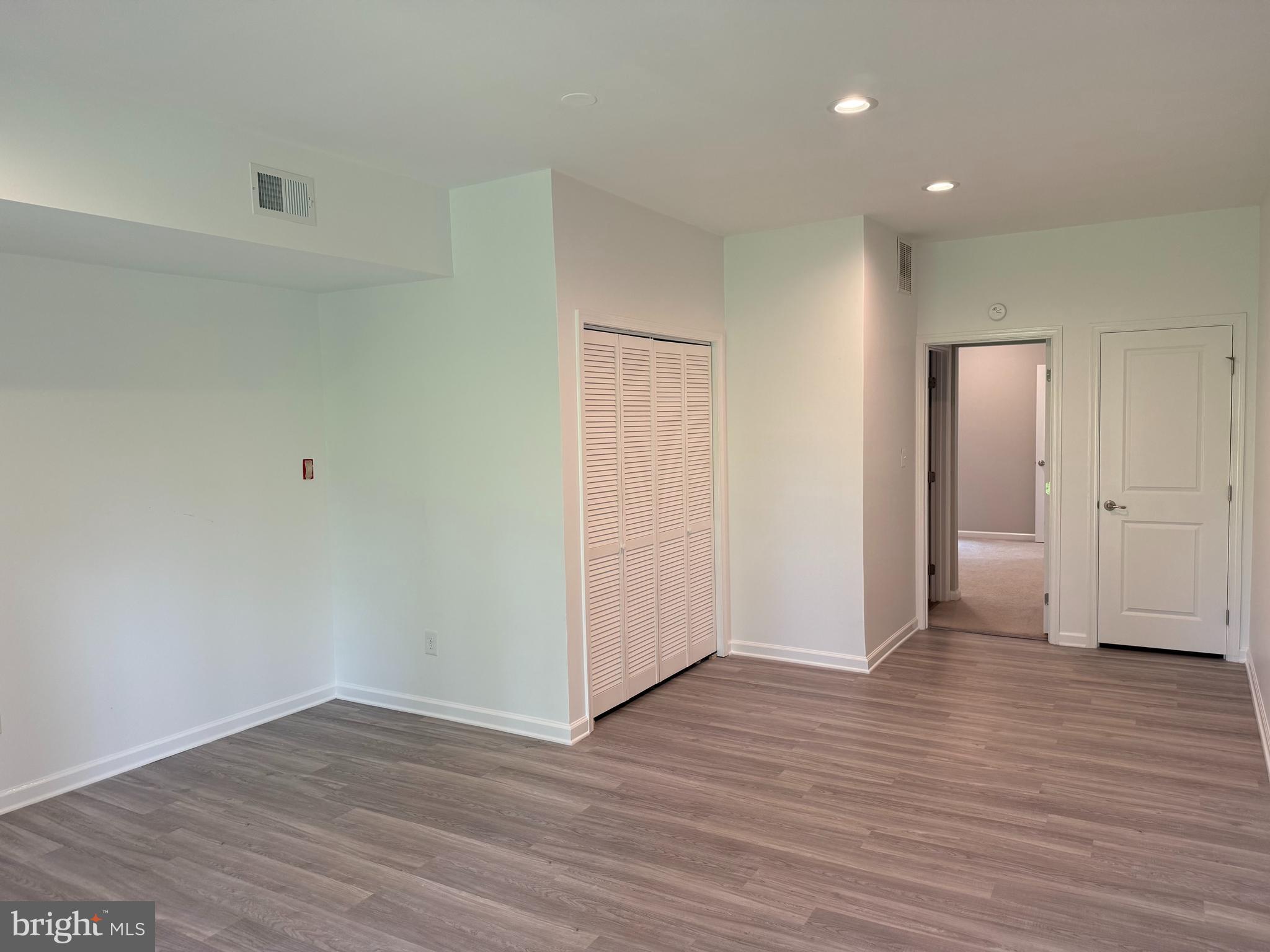 139 Streamview Drive Fredericksburg, VA 22405 - Photo 14 of 28 a view of an empty room with wooden floor