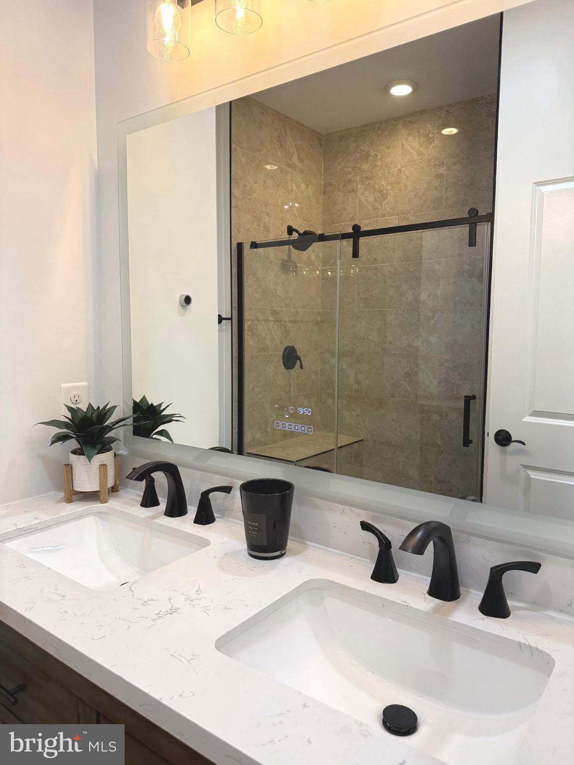 139 Streamview Drive Fredericksburg, VA 22405 - Photo 16 of 28 a bathroom with a sink and a mirror