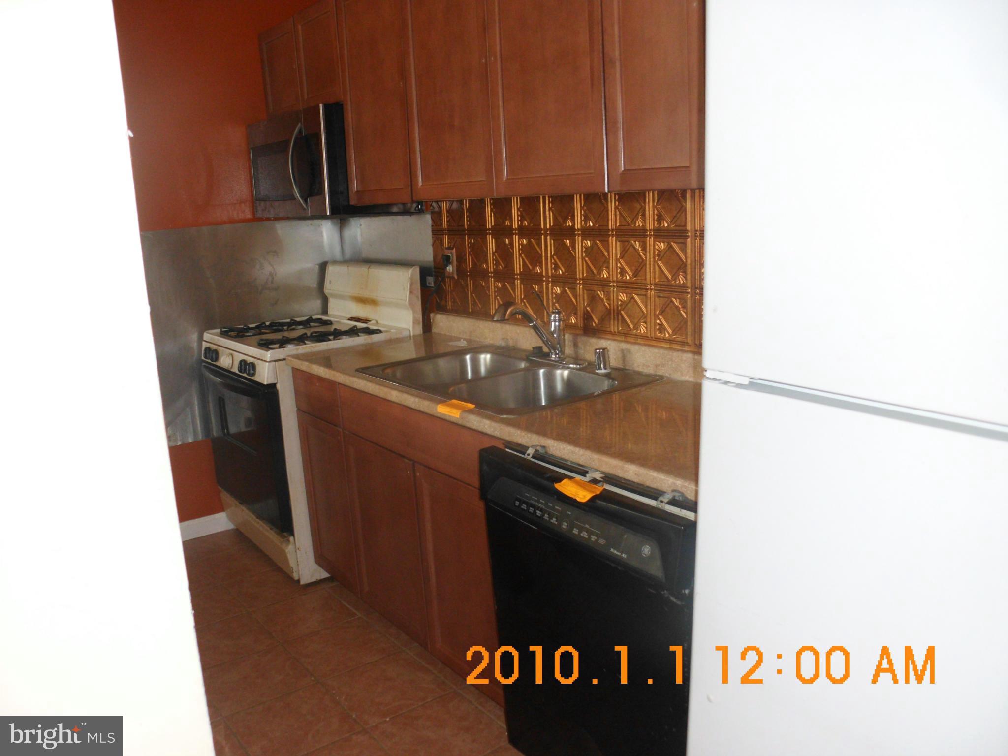 9282 Adelphi Road, Unit 3 Hyattsville, MD 20783 - Photo 14 of 18 Kitchen