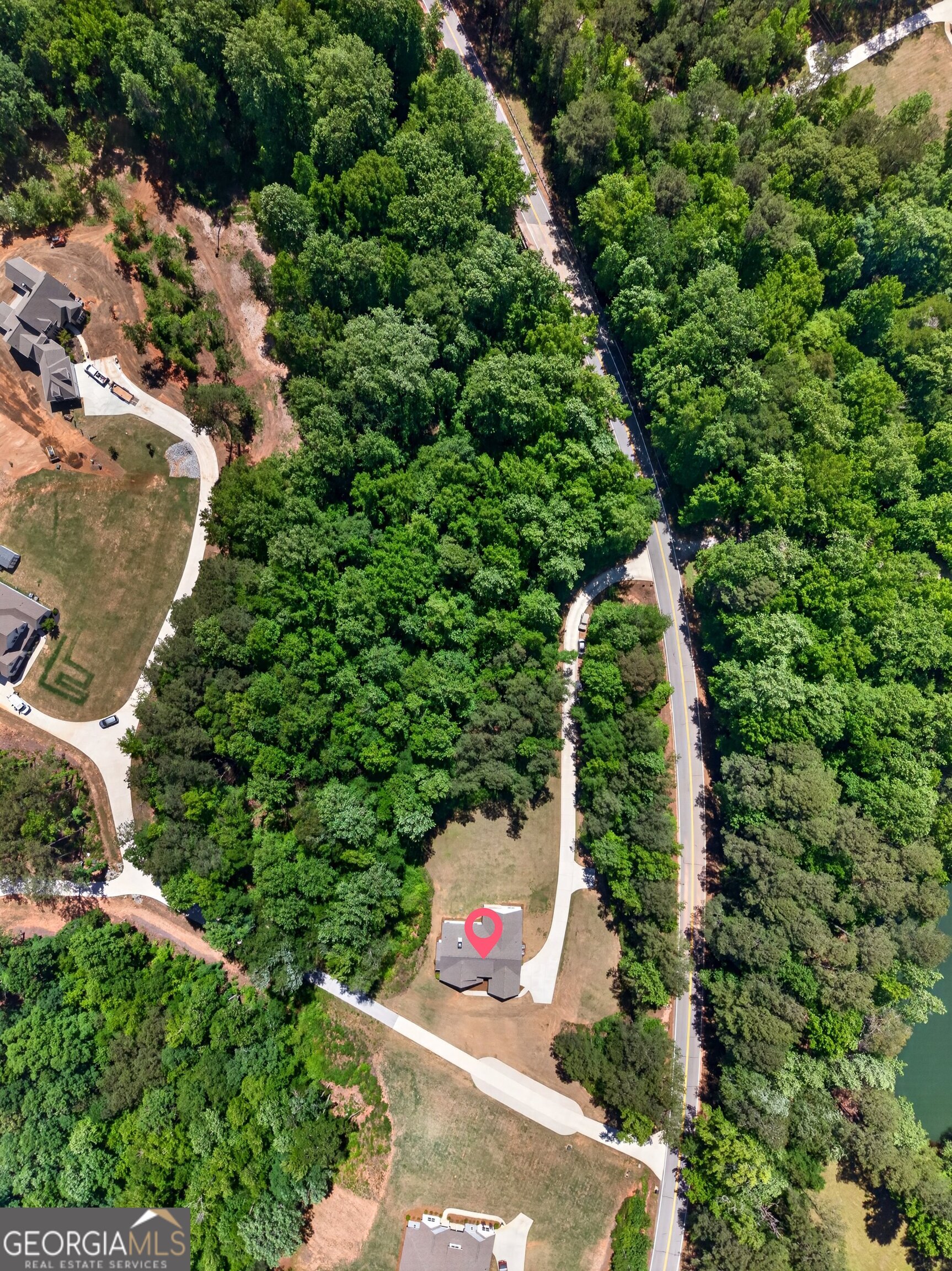 1764 Luther Bailey Road Senoia, GA 30276 - Photo 60 of 63 an aerial view of a house with a yard