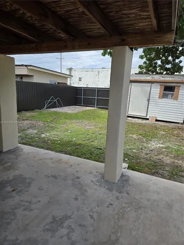 a view of bedroom with a hallway