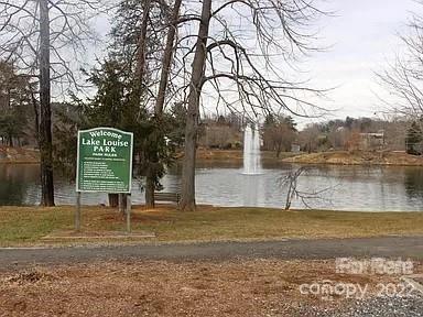 31 Banks Town Road Weaverville, NC 28787 - Photo 22 of 22 a view of a swimming pool with a yard and large trees