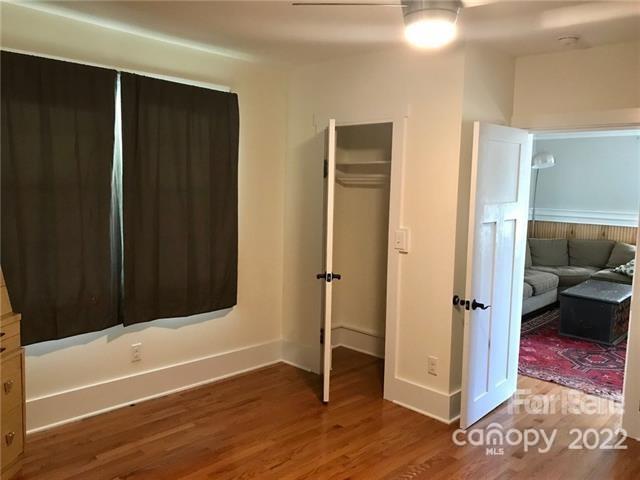 31 Banks Town Road Weaverville, NC 28787 - Photo 6 of 22 a view of a livingroom with wooden floor and a bathroom