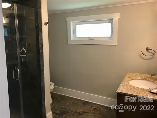 31 Banks Town Road Weaverville, NC 28787 - Photo 10 of 22 a bathroom with a sink and a toilet