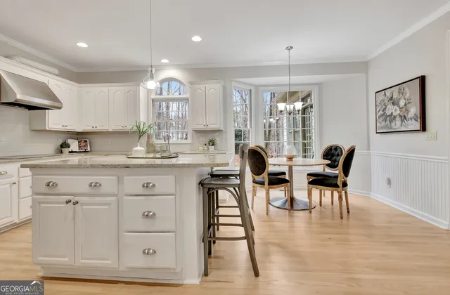 a bath room with a bath tub and a shower