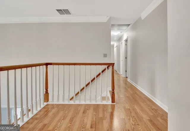 a view of a building with floor to ceiling windows
