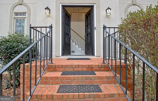 a view of a bathroom from the hallway