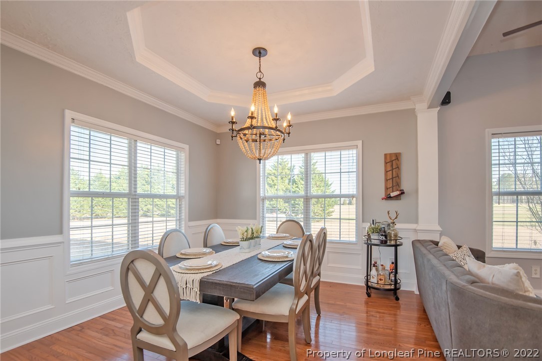 3577 Hayfield Road Wade, NC 28395 - Photo 11 of 47 a dining room with furniture window wooden floor