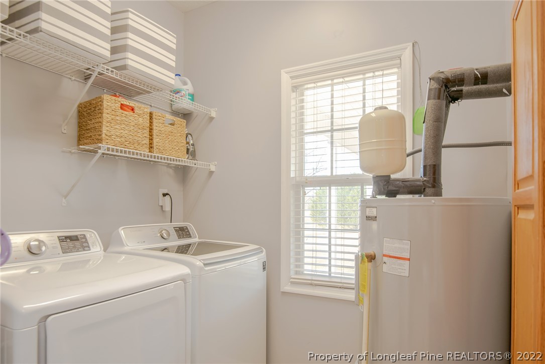 3577 Hayfield Road Wade, NC 28395 - Photo 14 of 47 a bathroom with a sink and a window