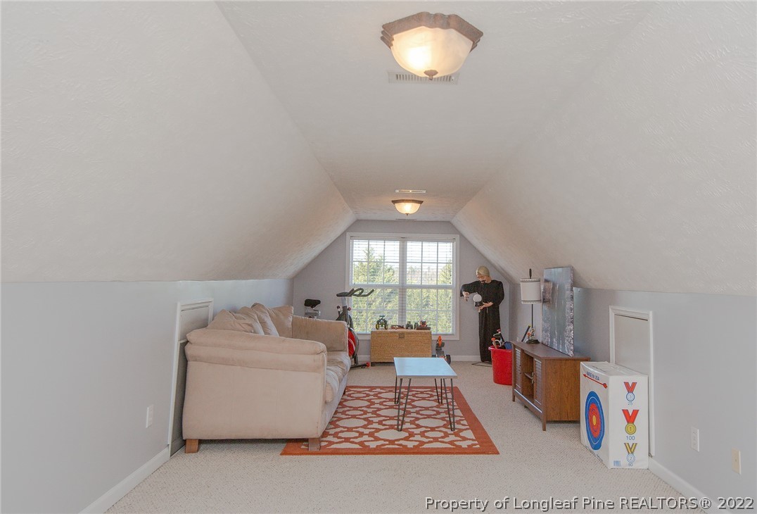3577 Hayfield Road Wade, NC 28395 - Photo 37 of 47 a living room with furniture and a window