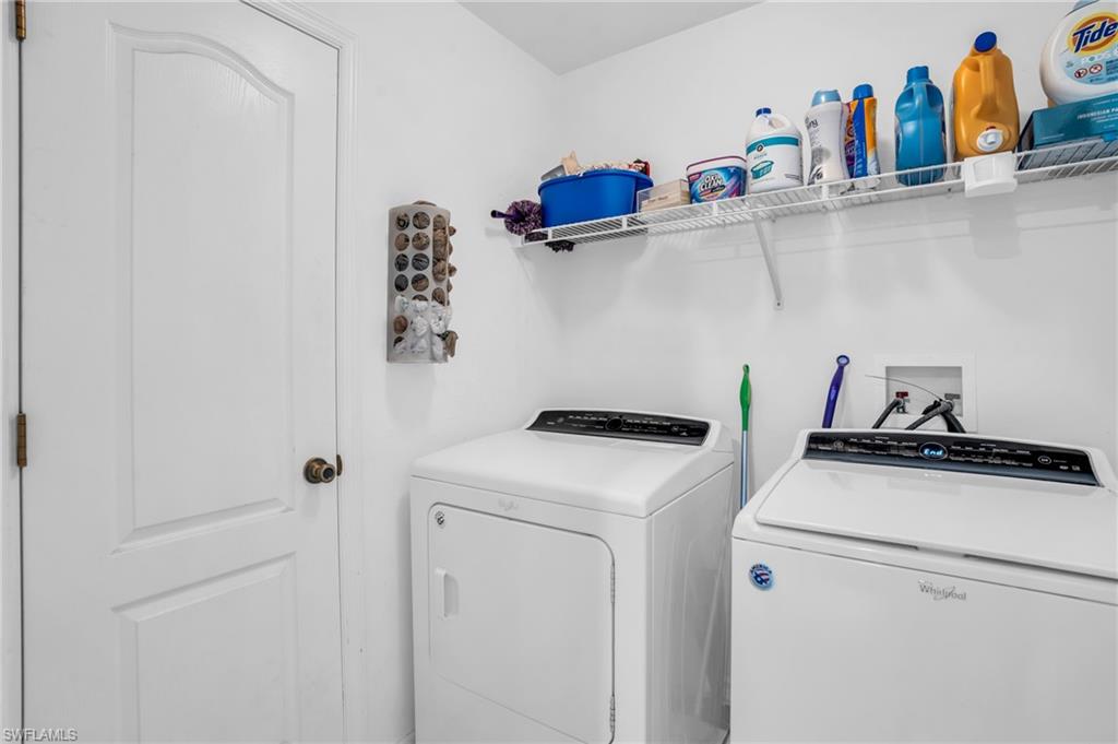 8069 Albatross Road Fort Myers, FL 33967 - Photo 16 of 21 Clothes washing area featuring washer and clothes dryer