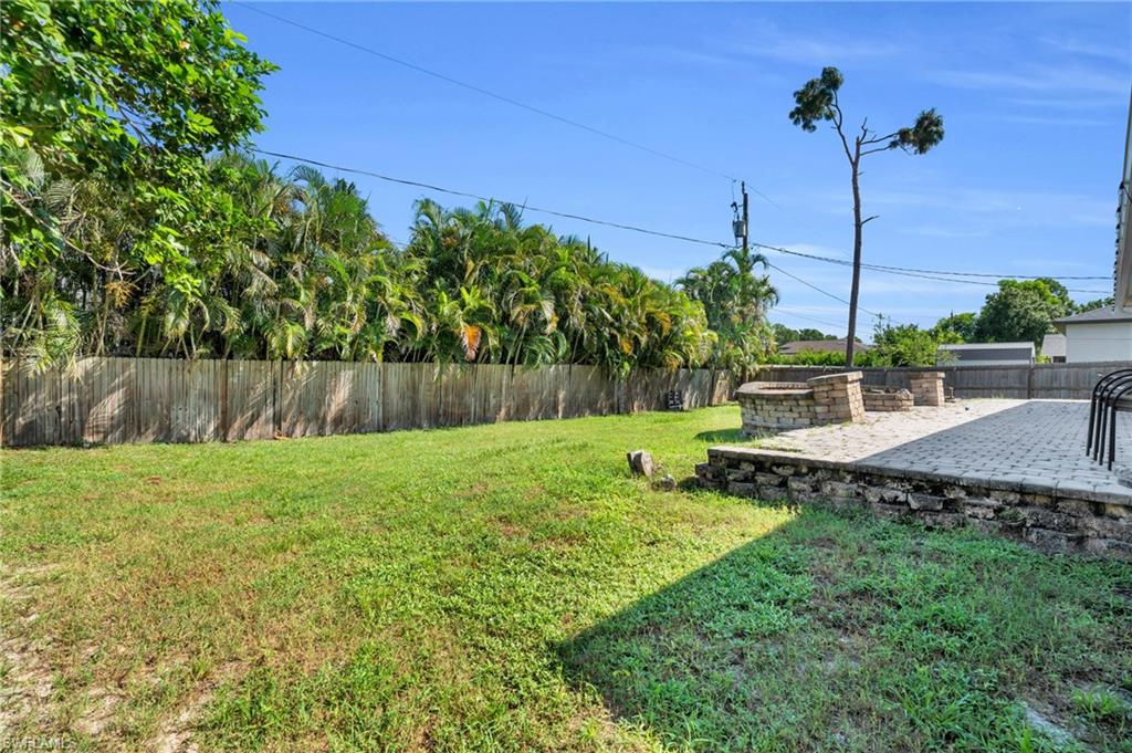 8069 Albatross Road Fort Myers, FL 33967 - Photo 17 of 21 View of yard with a patio