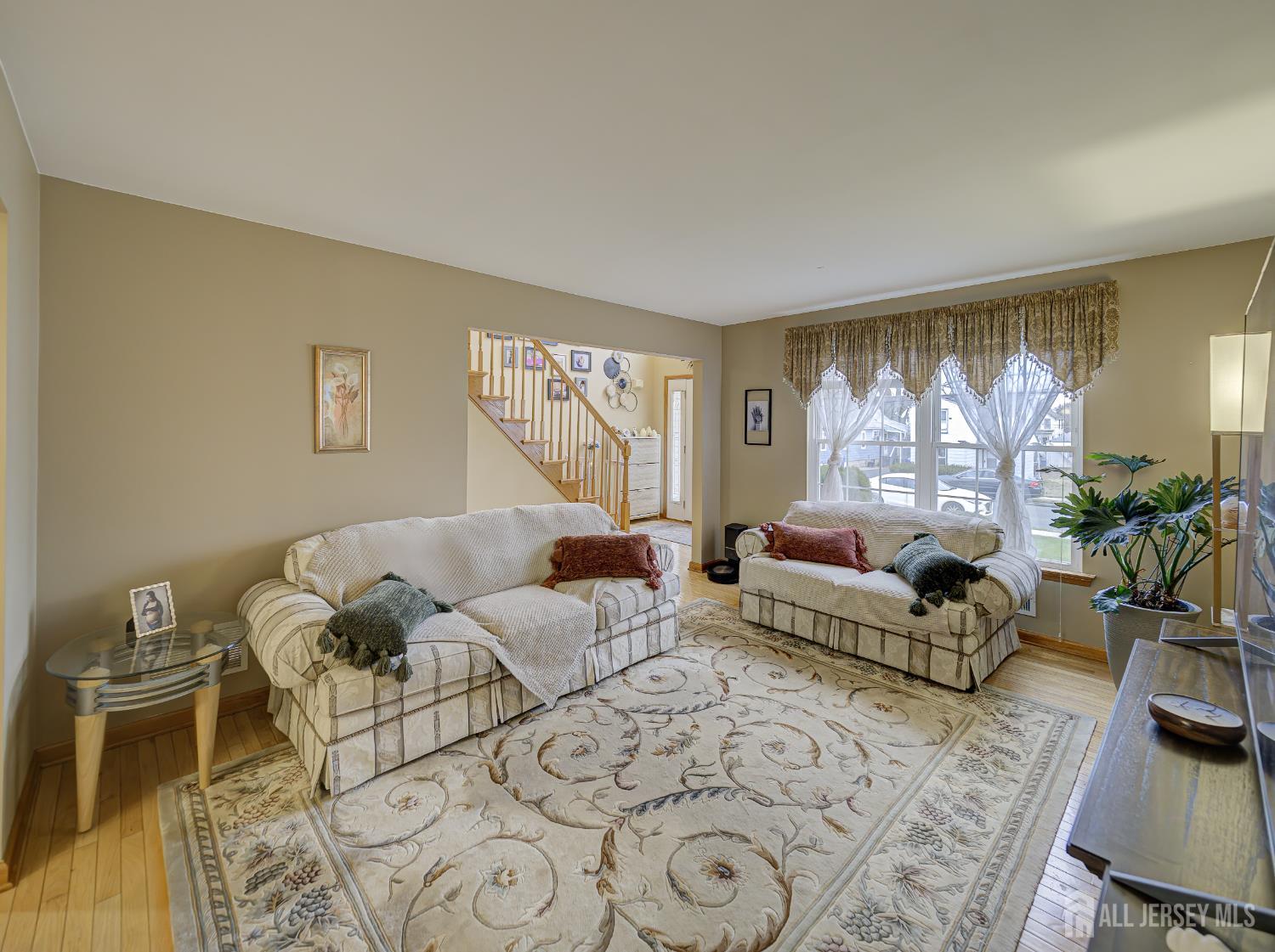 357 George Street South Amboy, NJ 08879 - Photo 12 of 36 a living room with furniture and a large window
