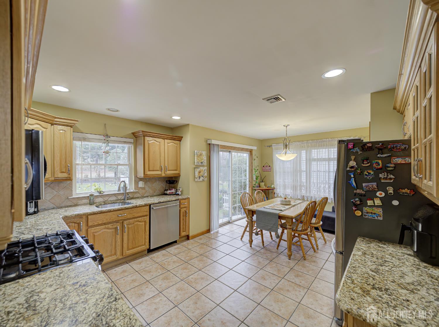 357 George Street South Amboy, NJ 08879 - Photo 19 of 36 a kitchen with a table and chairs