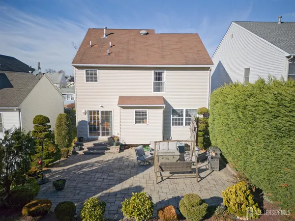 a view of a house with patio outdoor seating