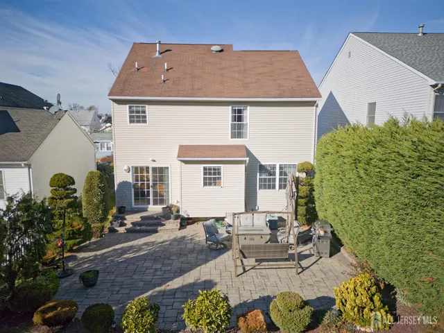 a view of a house with patio outdoor seating