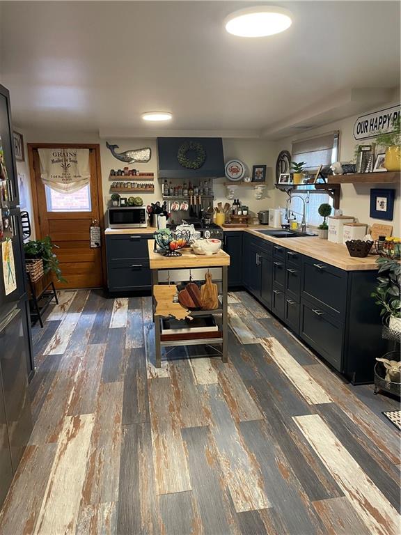 128 Lebanon Church Road Pittsburgh, PA 15236 - Photo 11 of 28 a kitchen with a sink appliances and cabinets