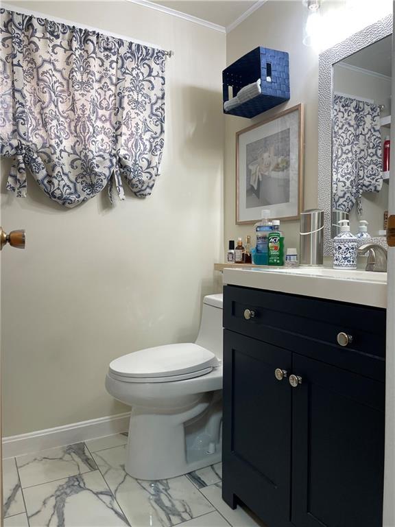 128 Lebanon Church Road Pittsburgh, PA 15236 - Photo 15 of 28 a bathroom with a sink toilet and mirror