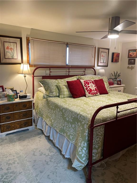 128 Lebanon Church Road Pittsburgh, PA 15236 - Photo 17 of 28 a bedroom with a bed and lamp