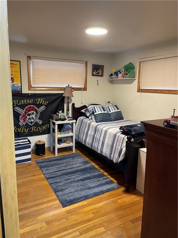 128 Lebanon Church Road Pittsburgh, PA 15236 - Photo 21 of 28 a bedroom with a bed and a window