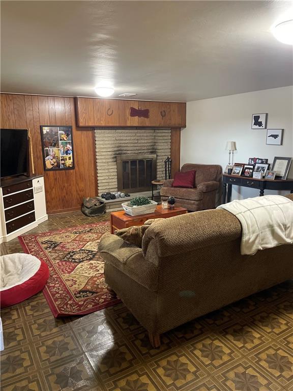 128 Lebanon Church Road Pittsburgh, PA 15236 - Photo 23 of 28 a living room with furniture and a fireplace